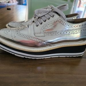 prada wingtip brogue platform sneakers